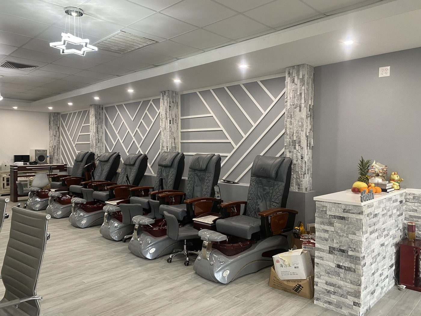 Completed nail salon build-out with custom wall panelling